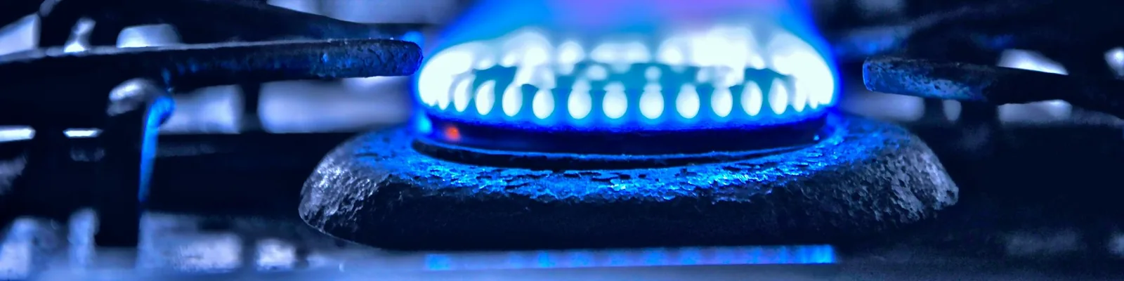 Gas burner running a clean blue flame after a pressure test